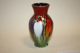 A SIGNED ANITA HARRIS ART POTTERY CROCUS PATTERN VASE