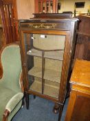AN EDWARDIAN MAHOGANY DISPLAY CABINET - WORM DAMAGE
