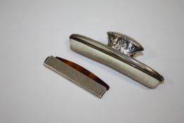 A VINTAGE HALLMARKED SILVER FOLDING COMB, TOGETHER WITH A FRENCH SILVER NAIL BUFFER