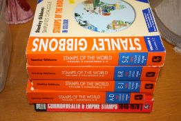 FIVE STANLEY GIBBONS STAMP CATALOGUES