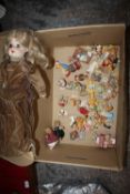 A COLLECTION OF SMALL AND MINIATURE TEDDY BEAR FIGURES, TOGETHER WITH A PORCELAIN HEADED DOLL