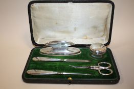 A BOXED HALLMARK SILVER MANICURE SET