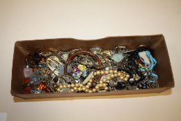 A BOX OF COSTUME JEWELLERY