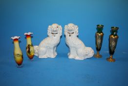 A PAIR OF STAFFORDSHIRE STYLE SPANIELS TOGETHER WITH TWO PAIRS OF GLASS VASES (6)