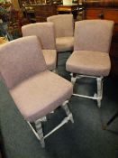 A SET OF 4 MODERN UPHOLSTERED SWIVEL BAR STOOLS