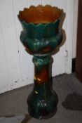 A GLAZED CERAMIC JARDINAIRE ON STAND