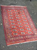 A RETRO WOOLLEN CARPET APPROX 160 CM X 134 CM