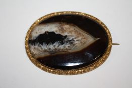 A LARGE ANTIQUE AGATE AND PINCHBECK BROOCH