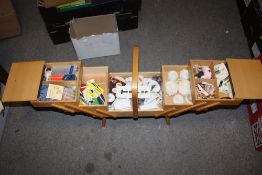 A FOLD OUT SEWING BOX AND CONTENTS