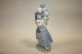A LLADRO BALLOON SELLER GIRL FIGURE