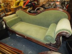 A WILLIAM IV MAHOGANY FRAMED SHAPED SCROLL ARM SETTEE