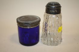 A HALLMARKED SILVER TOPPED BLUE GLASS VANITY JAR TOGETHER WITH A HALLMARKED SILVER TOPPED SUGAR