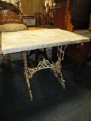 A VINTAGE CAST TABLE WITH HEAVY MARBLE TOP H-76 W-84.5 CM A/F