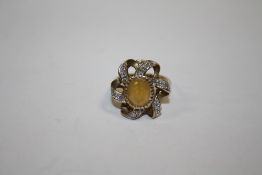 A HALLMARKED 9 CARAT GOLD DRESS RING SET WITH A CITRINE SIZE N APPROX WEIGHT - 4.8G