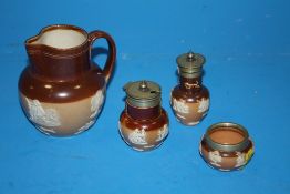 A ROYAL DOULTON LAMBETH THREE PIECE CRUET SET TOGETHER WITH A JUG