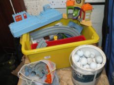 A BOX OF TRAIN TOYS PLUS A QUANTITY OF GOLF BALLS AND A JAM PAN (3)