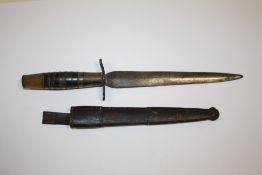 AN ANTIQUE DAGGER/ PLUG BAYONET IN LEATHER SHEATH