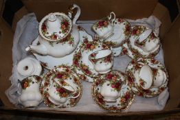 A TRAY OF ROYAL ALBERT OLD COUNTRY ROSES CHINA TO INCLUDE A TEAPOT