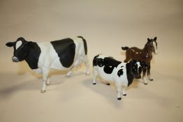 A LARGE BESWICK MATTE FINISH HEREFORD BULLFIGURE, TOGETHER WITH A GLOSS FINISH HEREFORD COW FIGURE
