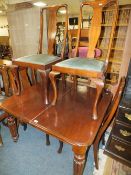 A VICTORIAN MAHOGANY PULL-OUT EXTENDING DINING TABLE WITH ONE SPARE LEAF H-72 W-101 L-110 CM L-165
