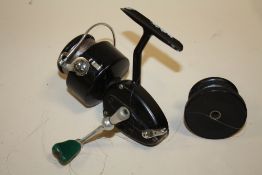 A VINTAGE MITCHELL 350 FISHING REEL WITH SPARE SPOOL