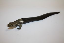 A NOVELTY LETTER OPENER IN THE FORM OF A LIZARD