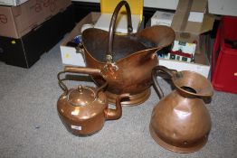 A COPPER HELMET SHAPED COAL BUCKET, TOGETHER WITH A COPPER KETTLE AND A COPPER GALLON JUG (3)