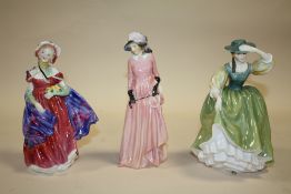 A ROYAL DOULTON MAUREEN FIGURE HN924, A ROYAL DOULTON BUTTERCUP FIGURE HN2309 AND A ROYAL DOULTON