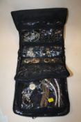 A ROLL BAG OF ASSORTED COSTUME JEWELLERY