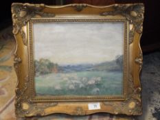 A GILT FRAMED IMPRESSIONIST OIL ON CANVAS LAID ON BOARD DEPICTING A WOODED LANDSCAPE WITH SHEEP