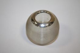 AN ANTIQUE SILVER RIMMED TABLE VESTA