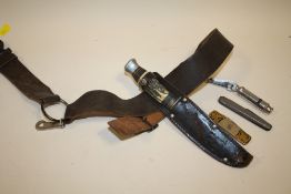 A SCOUTS LEATHER KNIFE BELT TOGETHER WITH TWO OTHER PENKNIVES