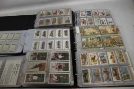 SIX FOLDERS CONTAINING SETS OF COLLECTORS CARDS BY WILLS, PLAYERS, PARK DRIVE, EWBANKS, OXO,