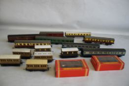 EIGHT ASSORTED UNBOXED HORNBY OO GAUGE CARRIAGES, together with eight Hornby four wheel carriages,