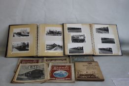 TWO ALBUMS OF VINTAGE TRAIN PHOTOGRAPHS, together with six vintage Illustrated railway magazines.