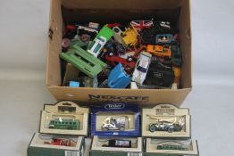 A COLLECTION OF BOXED AND LOOSE DIECAST VEHICLES to include Dinky, Corgi, Matchbox, Burago, Maisto
