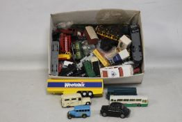 A BOX OF PLAYWORN DIE CAST VEHICLES, to include trucks, buses, and trains