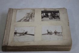 AN EDWARDIAN PHOTOGRAPH ALBUM, containing American interest photographs of ships and various