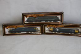 THREE BOXED 00 GAUGE MAINLINE DIESEL LOCOMOTIVES, class 56 BR Blue Livery 37035, class 56 revised