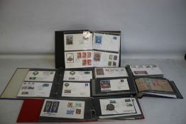 FIVE ALBUMS OF FIRST DAY AND COMMEMORATIVE COVERS, to include railway types and a selection from
