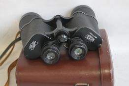 CARL ZEISS, JENA JENOPTEM 10 X 50 BINOCULARS, in fitted brown leather case