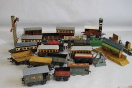 A UNBOXED 0 GAUGE HORNBY CLOCKWORK TRAIN SET WITH TWO KEYS, to include two Locomotives, twelve