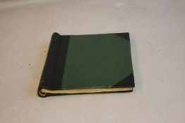 AN ALBUM OF BRITISH STAMPS QV-QEII, to include two penny blacks (a red Maltese Cross and a black),