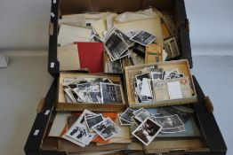 TWO BOXES OF EARLY-MID 20TH CENTURY PHOTOGRAPHS, both loose and in albums mainly of people and