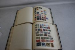 TWO ALBUMS OF WORLD STAMPS, to include a selection of Germany and an interesting group of Persia /