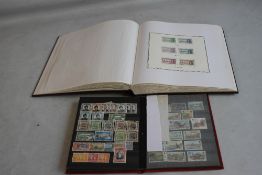 A COLLECTION OF GEORGE VI COMMONWEALTH VICTORY STAMPS TO AN ALBUM AND A STOCK BOOK, to include