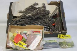 A BOX OF 00 GAUGE TRACK AND SCENERY plus two Triang Hornby boxed rolling stock.