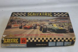 SCALEXTRIC MODEL MOTOR RACING SET 31, complete with track, cars, hand controls.