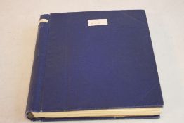 AN ALBUM OF WORLD STAMPS, to include a selection of early-mid 20th century issues.