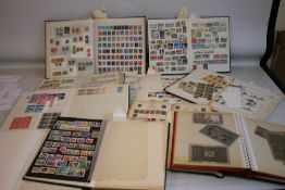 A COLLECTION OF MISCELLANEOUS BRITISH AND WORLD STAMPS, to stock books and albums. (QTY).